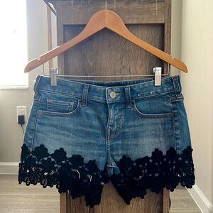Black lace trim jean shorts